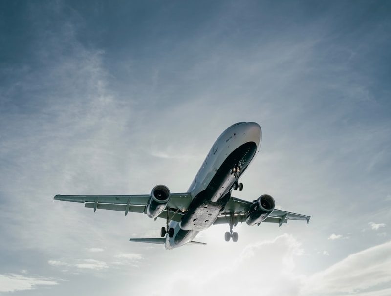 a plane flying over water