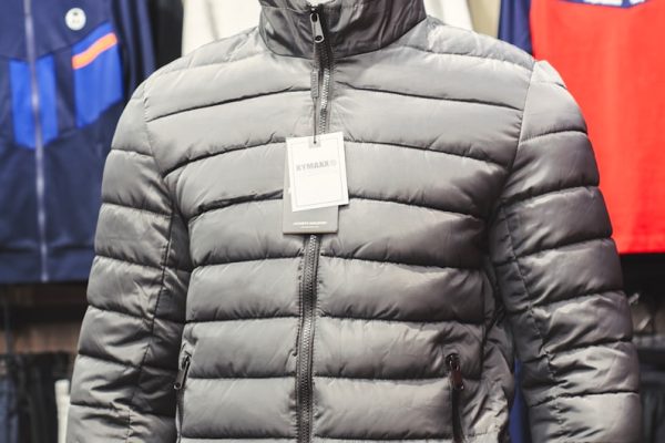 a mannequin wearing a jacket with a hood