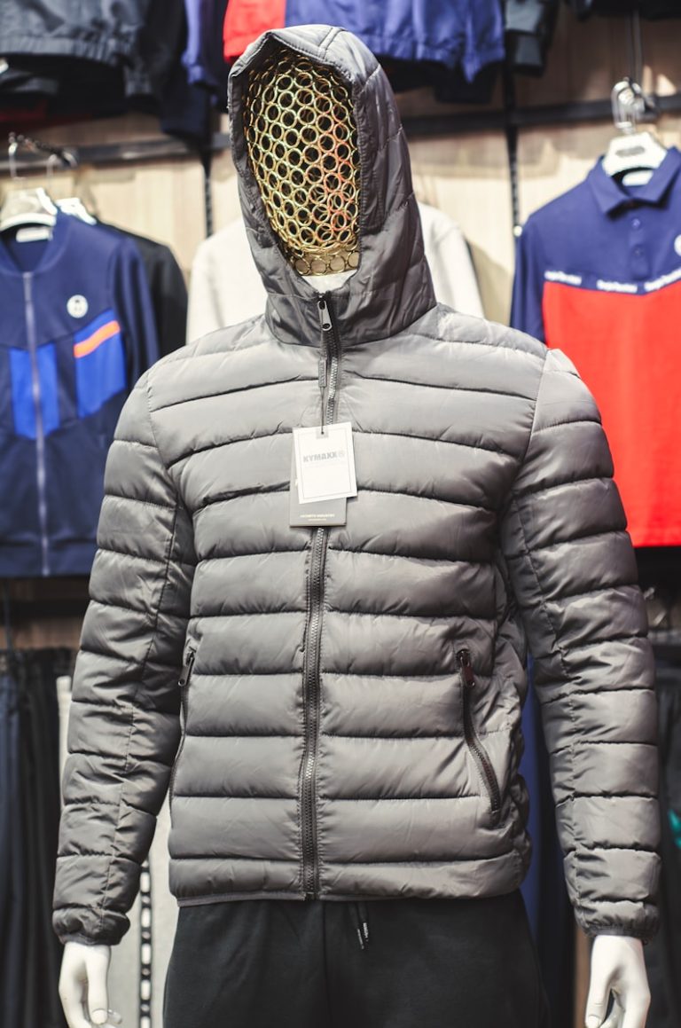 a mannequin wearing a jacket with a hood